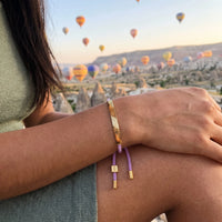 Thumbnail for Armband lila — getragen auf einer Reise, Gold | SKU: lemauve-g