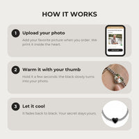 Thumbnail for How it works: upload your photo, warm the heart charm with your thumb, let it cool back to black | SKU: TPH-HRTB-SILVER